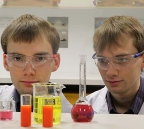 Twin brothers Douglas (left) and Alex Dunn are making nanoparticles for carrying cancer drugs more patient-friendly