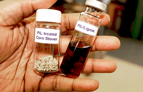 PIL-treated corn stover and PIL/lignin