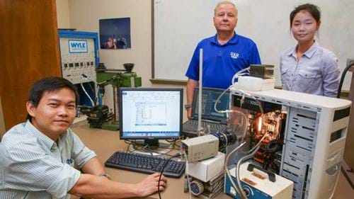 Graduate students Cuong Nguyen and Xiaolin Wang