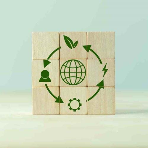 Circular economy icons on wooden blocks